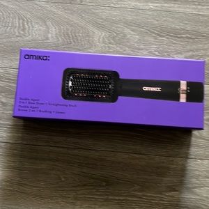 Amika heated styling brush brand new never used.